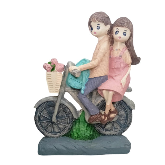 OSTNKART Resin Love Couple on Cycle Statue – Romantic Showpiece for Home Decor and Gifting, Ideal for Valentine’s Day, Anniversary, Weddings,Birthdays, Engagements (6x4.9 Inches)